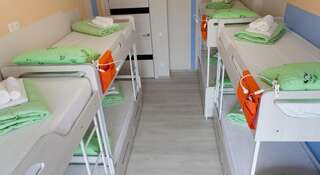 Гостиница Квартира 244 на Перелета, 32 Омск Кровать в общем 8-местном номере для мужчин-3